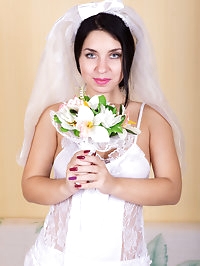 Beautiful bride Tanita in white
