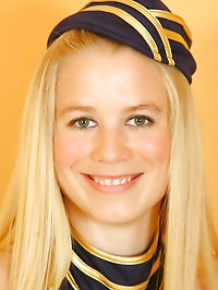 Busty blonde Gabriella wearing a sexy air hostess uniform..