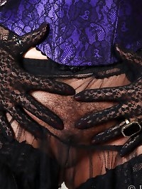 Danica Collins in sexy black lace gloves